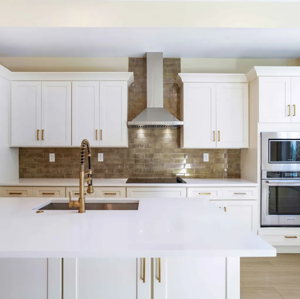 Kitchen remodeling services in Gwinnett County GA — completed renovation with white cabinets